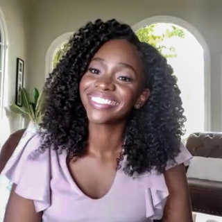 Teyonah Parris with a long haircut and voluminous texture